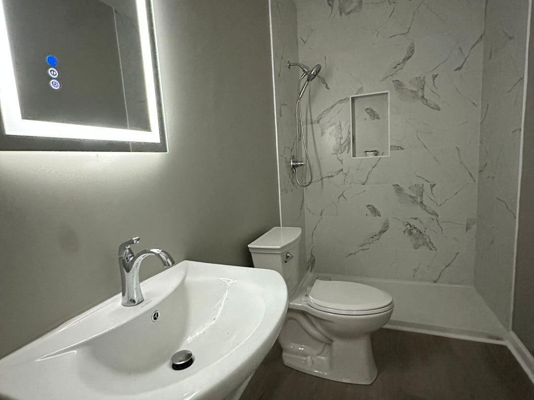Second view of the completed primary bathroom remodel